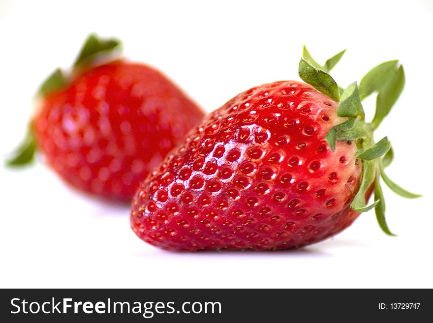 Amazing closeup of red strawberry in white background