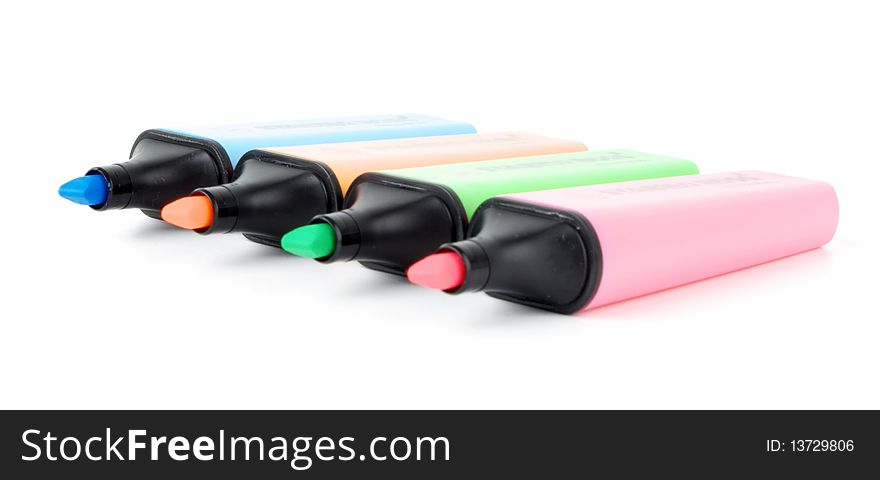 Four highlighter marker pens isolated on white background