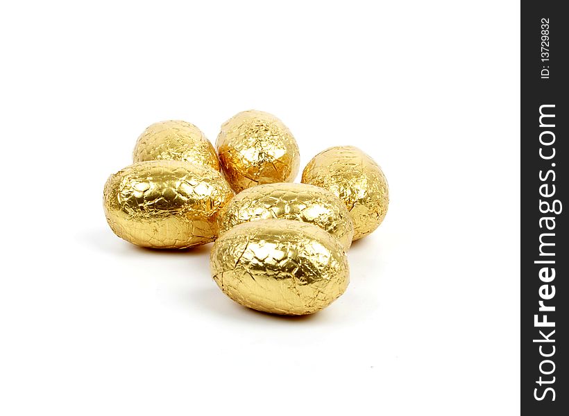 Easter chocolate eggs on white background