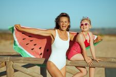 Mother And Daughter Holding Funny Watermelon Towel Royalty Free Stock Photos