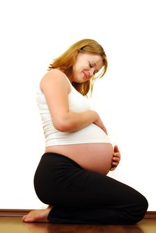 Pregnant Woman Against White Royalty Free Stock Photography