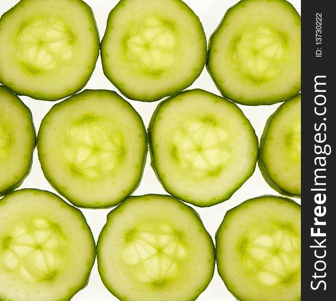 Cucumber slices on white background