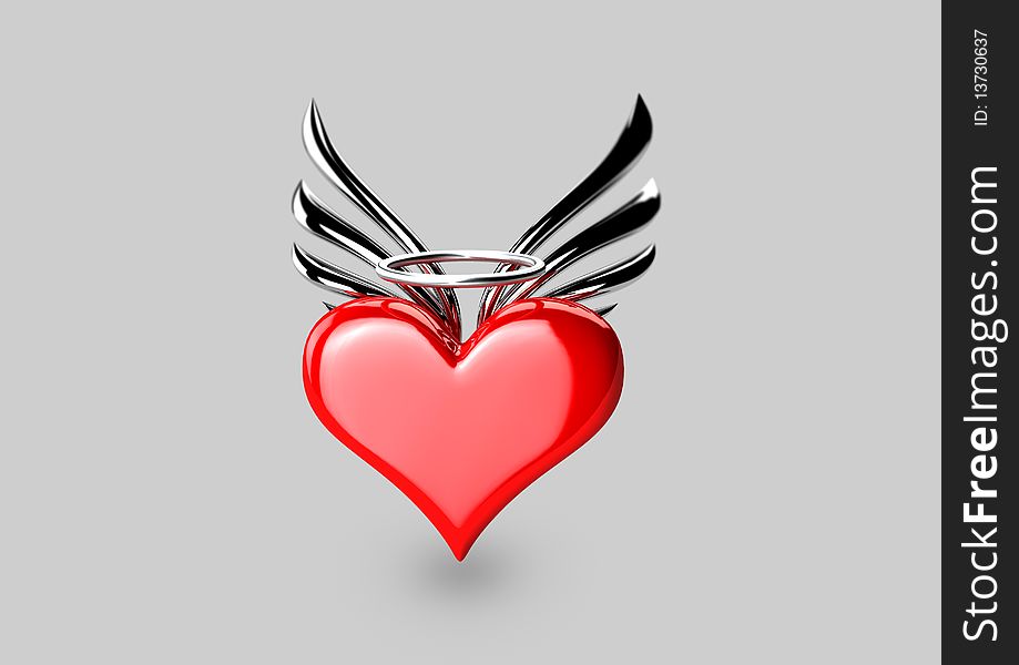 An ornamental piece of jewellery featuring a heart, halo and wings. An ornamental piece of jewellery featuring a heart, halo and wings