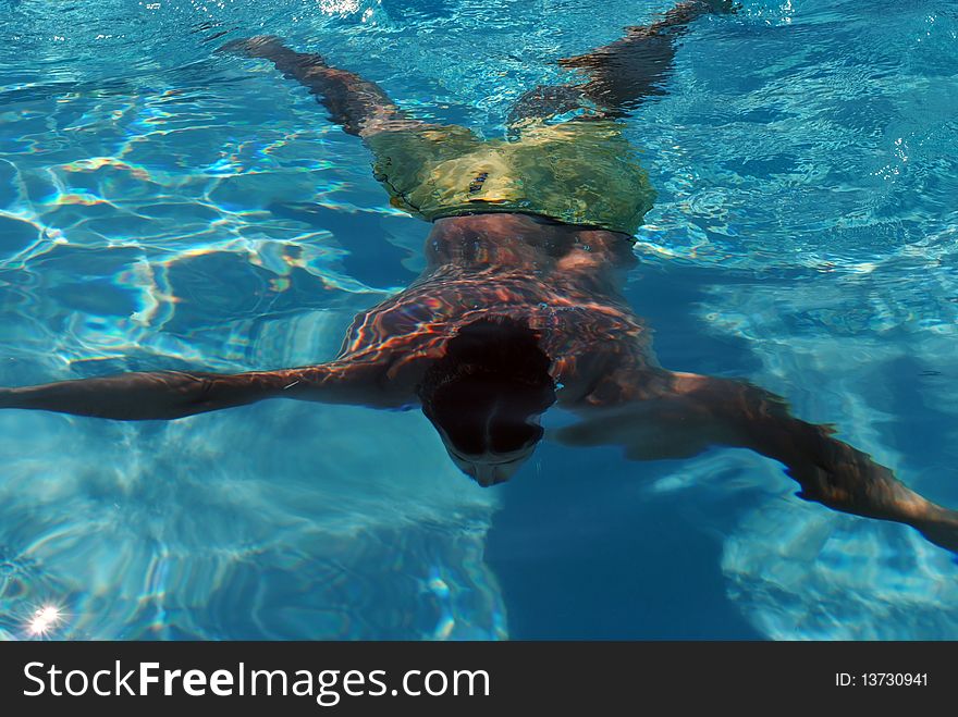 Underwater swimmer, holiday and leisure background