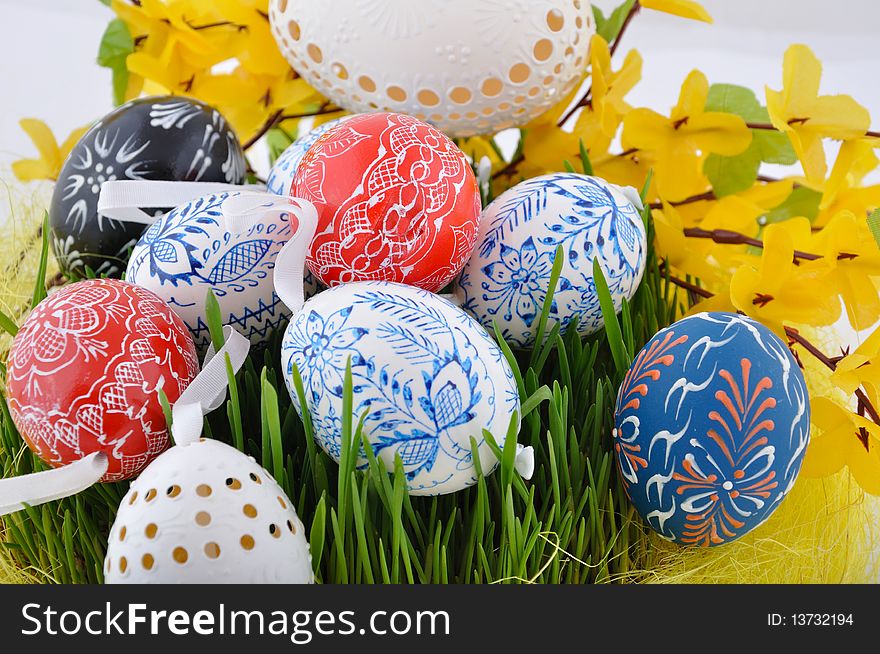 Hand painted czech easter eggs in fresh green grass