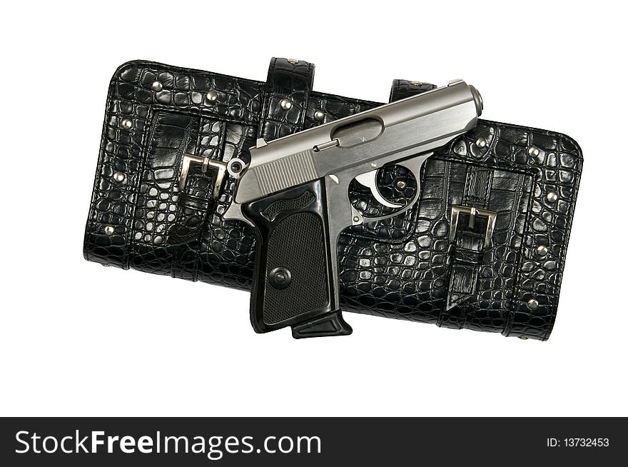This is a black clutch purse with a 9mm gun. It symbolizes a femaleâ€™s security. This is a black clutch purse with a 9mm gun. It symbolizes a femaleâ€™s security.