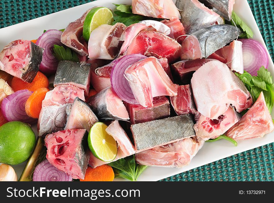 Raw fish with fresh vegetables. Raw fish with fresh vegetables.