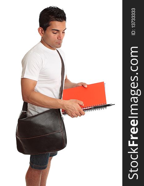 A college or university student with brown bag and books