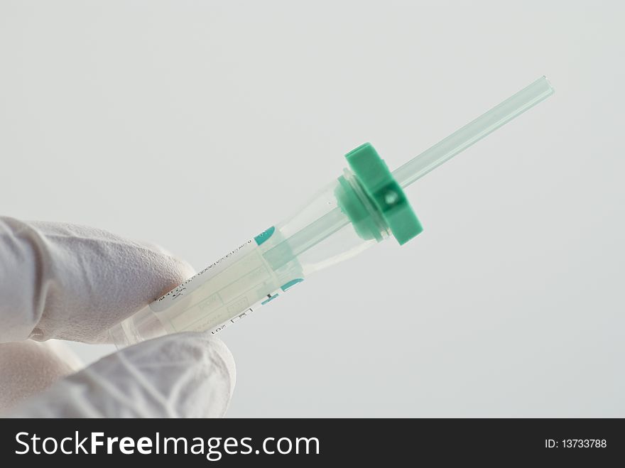 A test tube for capillary blood sample. The green colour means you get plasma.