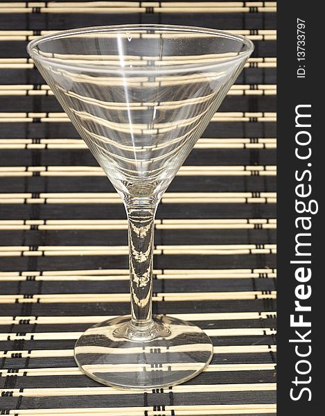 Martini glass on striped cloth