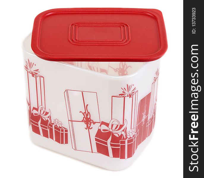 Plastic container with red lid and pattern on white background