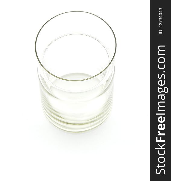 Glass tumbler, on a white background