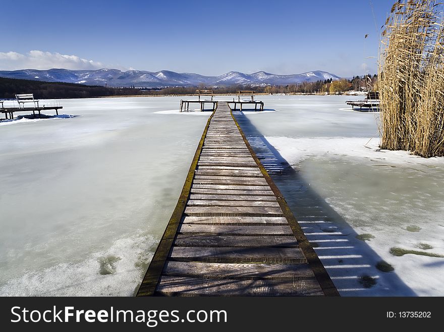 Pier wintertime on the lake, high density range image. Pier wintertime on the lake, high density range image