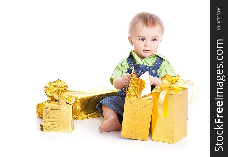 Baby with gifts. Isolated on white background