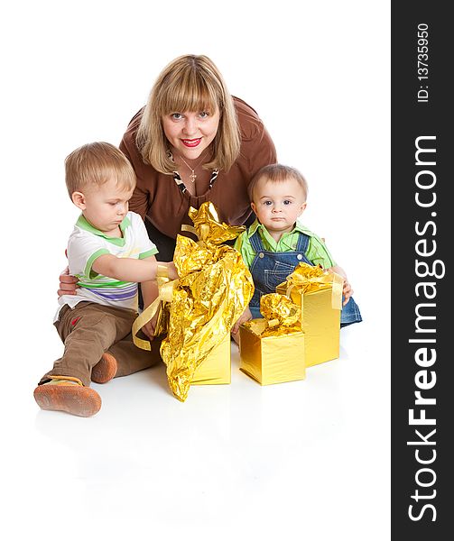 Two boys and mother with gifts