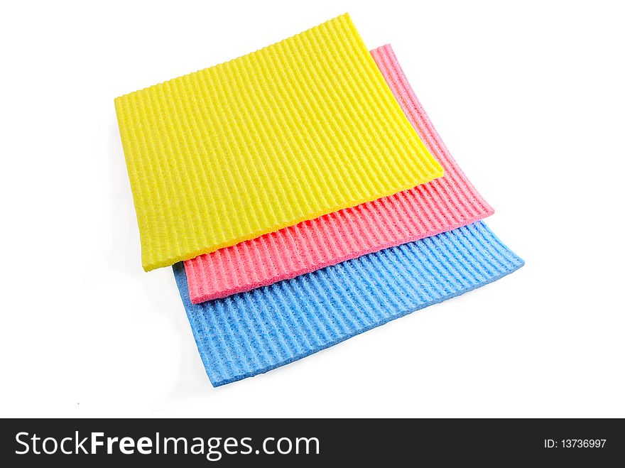 Three multi-coloured napkins isolated on a white background