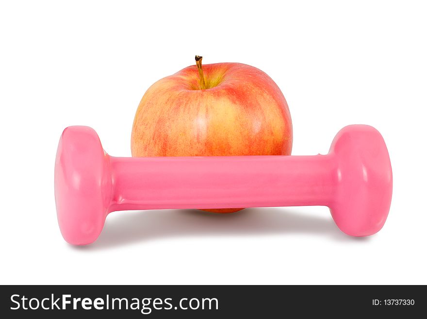 One dumbbell and red apple on a white background. One dumbbell and red apple on a white background