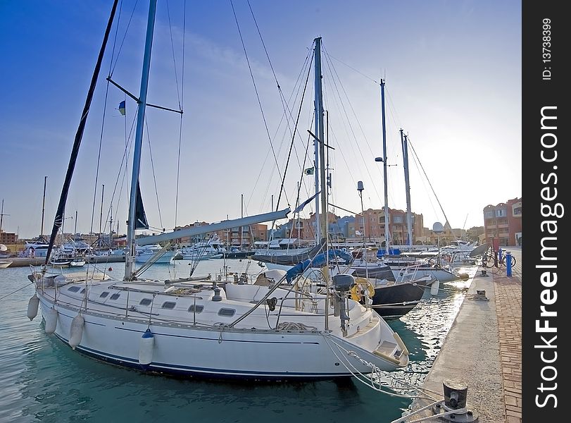 Sailing yachts at sunset