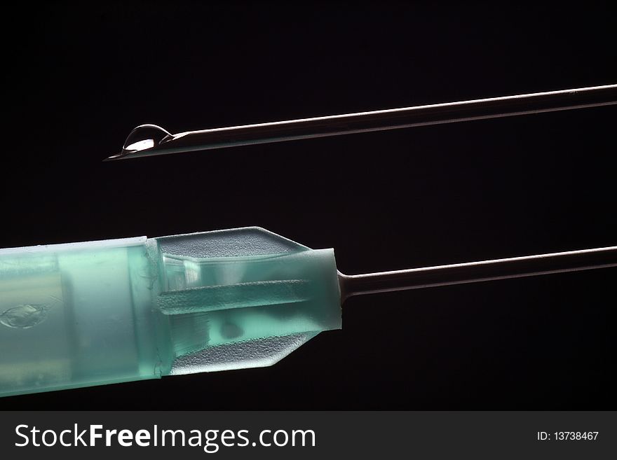 Syringe and needle.