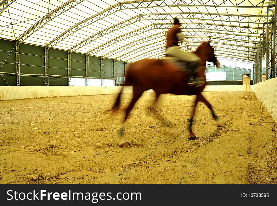 The horseman on a horse at hippodrome