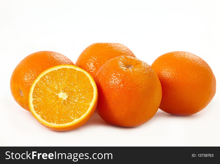 Fresh oranges on white background