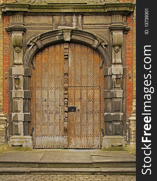 Closeup on brown front church doors