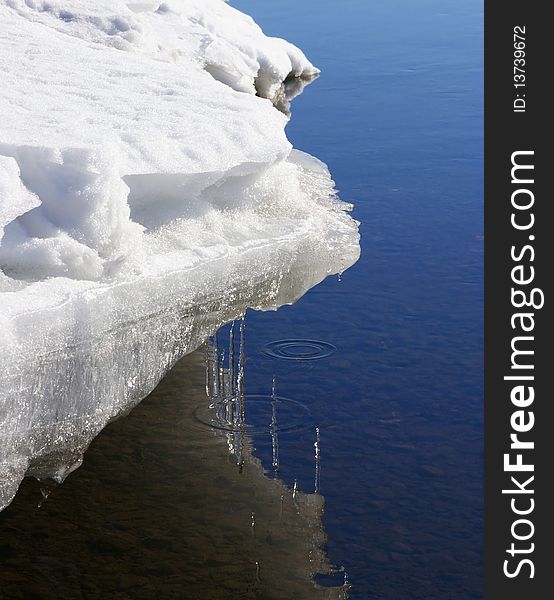 Icicles over water сlose up