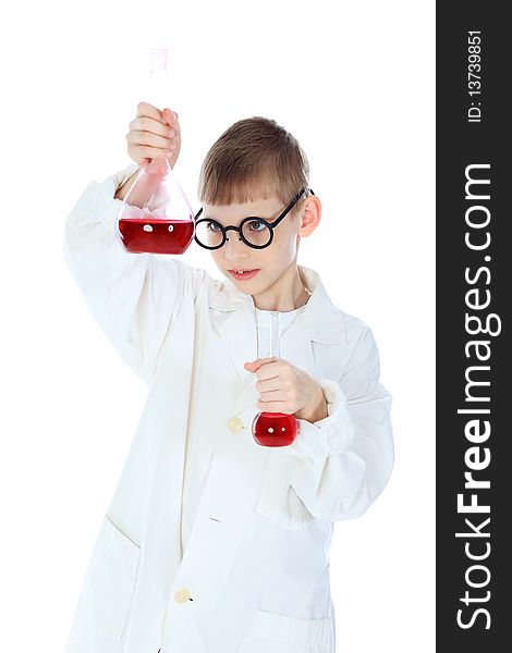 Shot of a little boy in a doctors uniform. Isolated over white background. Shot of a little boy in a doctors uniform. Isolated over white background.