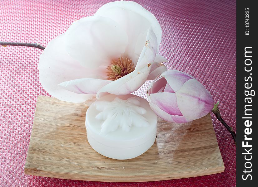 Soaps and sponges with magnolia flower. Soaps and sponges with magnolia flower
