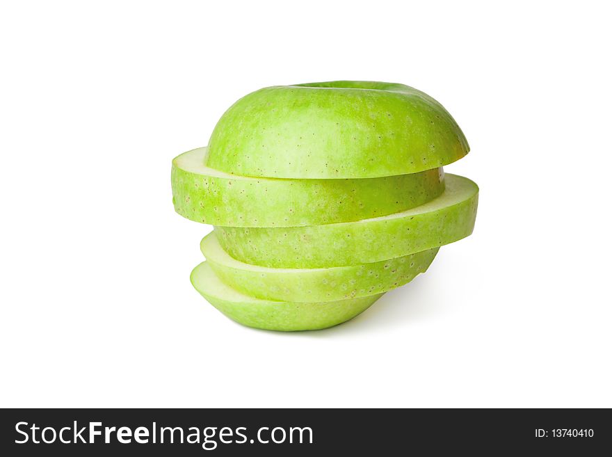 Sliced green apple isolated on white. Sliced green apple isolated on white.