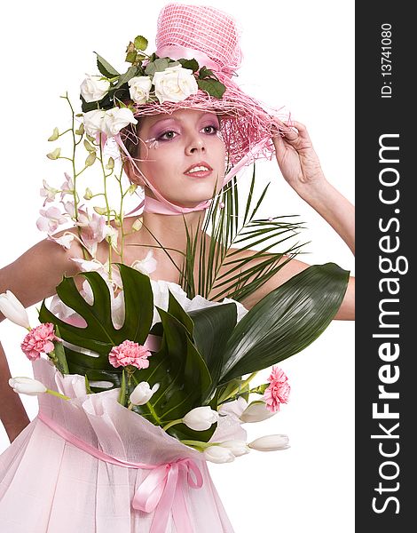 Fashion woman is bouquet of flowers. Elegant model with roses in her hat and and with tulips, carnation, orchids in her dress from wrapping. Fashion woman is bouquet of flowers. Elegant model with roses in her hat and and with tulips, carnation, orchids in her dress from wrapping.