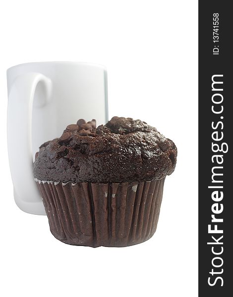 Chocolate muffin and a white cup of tea on white background. Chocolate muffin and a white cup of tea on white background