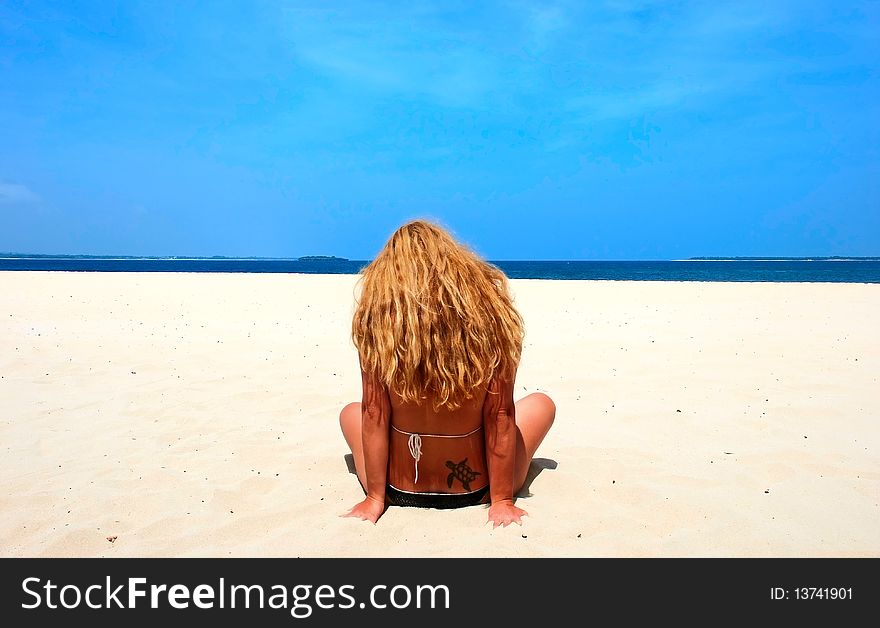 Blonde woman on the beach. Blonde woman on the beach