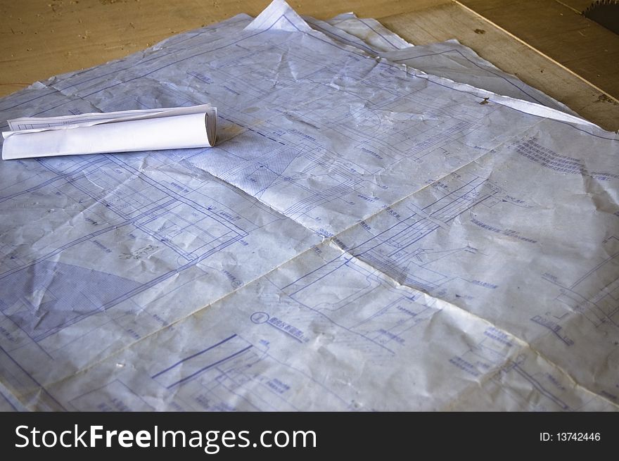Architecture blue print papers on table. Architecture blue print papers on table