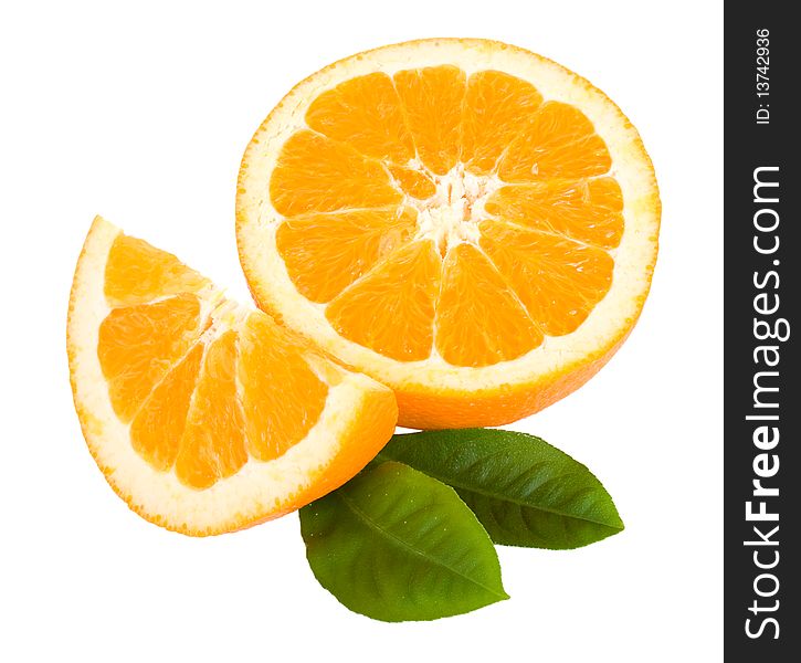 Close-up cut orange fruit with leaves