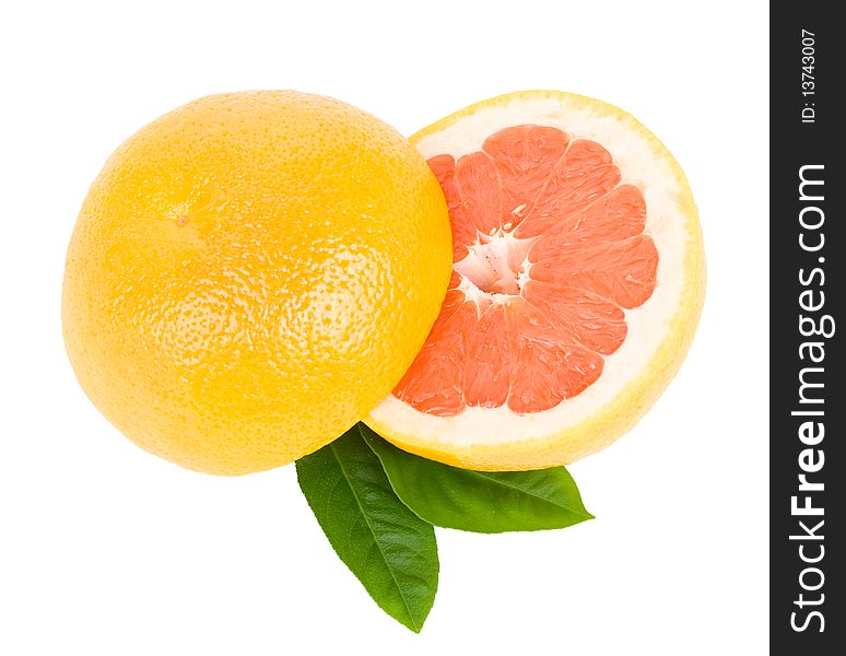 Cut Red Grapefruit With Leaves