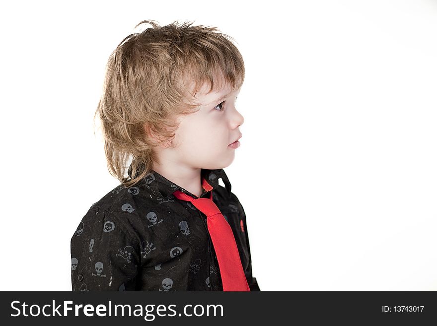 Cute child with red tie looking curious away. Cute child with red tie looking curious away