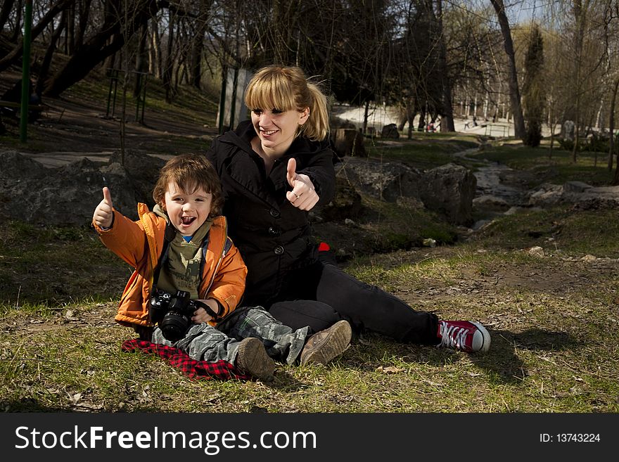 Cute child and his mother showing Thumbs up. Cute child and his mother showing Thumbs up