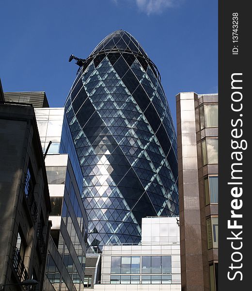 Gherkin building of London with blue sky