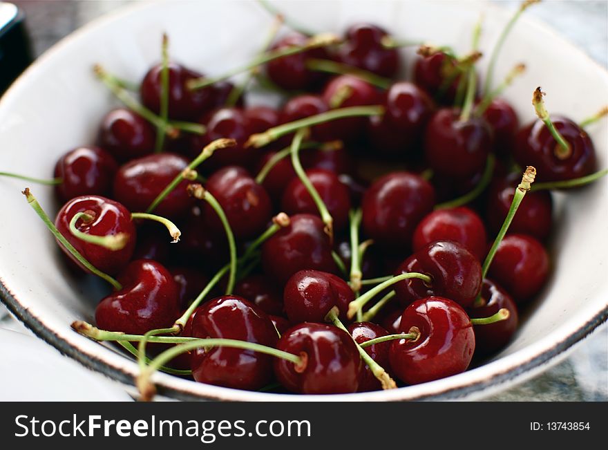 Bowl of fresh ruby red cherries. Bowl of fresh ruby red cherries