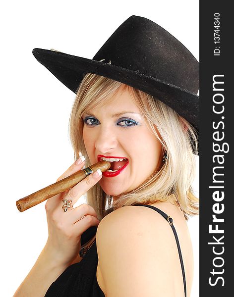 Blond cowgirl with cigar in big black hat with red lips isolated on the white.