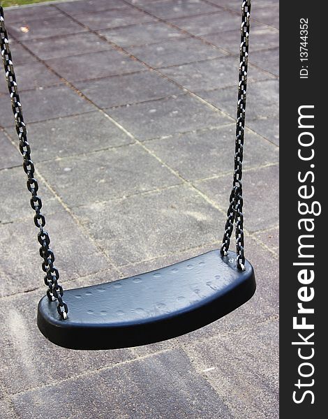 Empty Swing On The Playground, Isolated