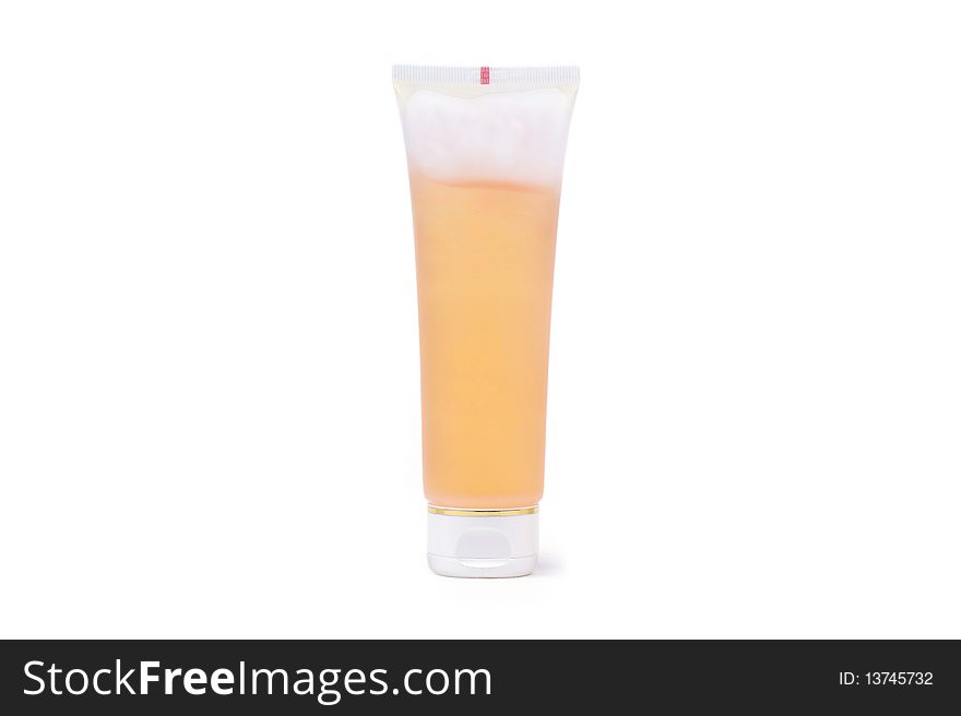 Orange Tube With Cream On White