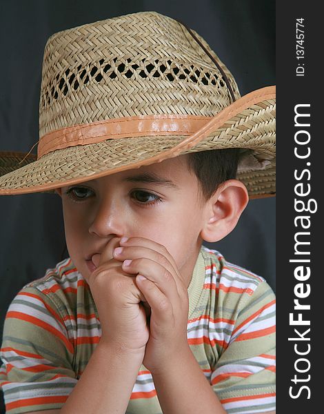 The image of a young child's cowboy hat. The image of a young child's cowboy hat