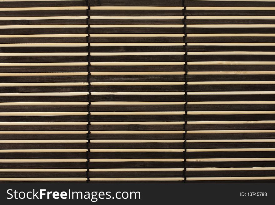 Abstract background of white bamboo with dark inserts. Abstract background of white bamboo with dark inserts