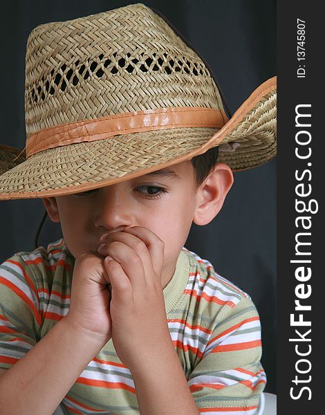 The image of a young child's cowboy hat. The image of a young child's cowboy hat
