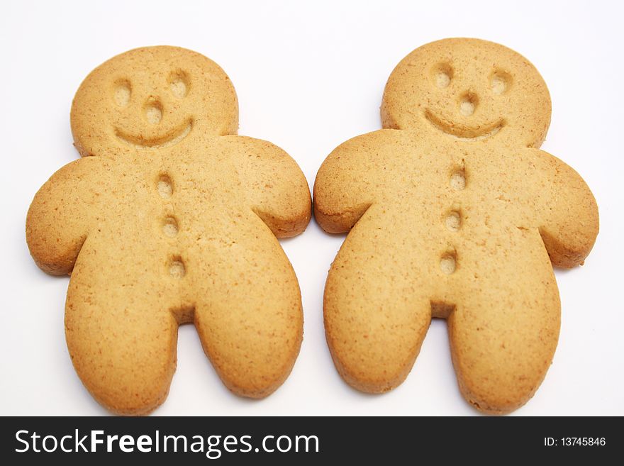 Two gingerbread cookies isolated on white. Two gingerbread cookies isolated on white
