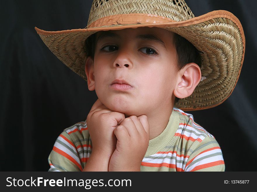 The image of a young child's cowboy hat. The image of a young child's cowboy hat