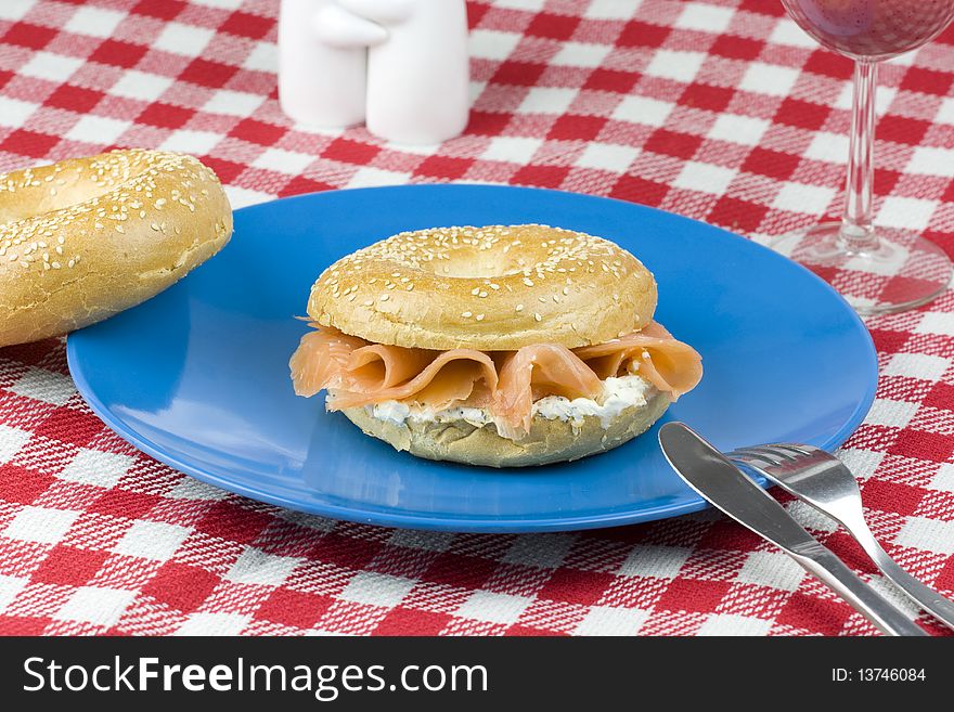 Tasty bagel with smoked salmon and cream cheese. Tasty bagel with smoked salmon and cream cheese.