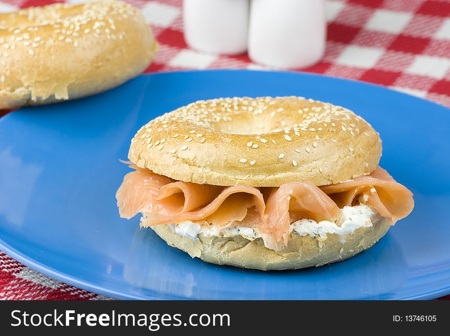 Tasty bagel with smoked salmon and cream cheese. Tasty bagel with smoked salmon and cream cheese.